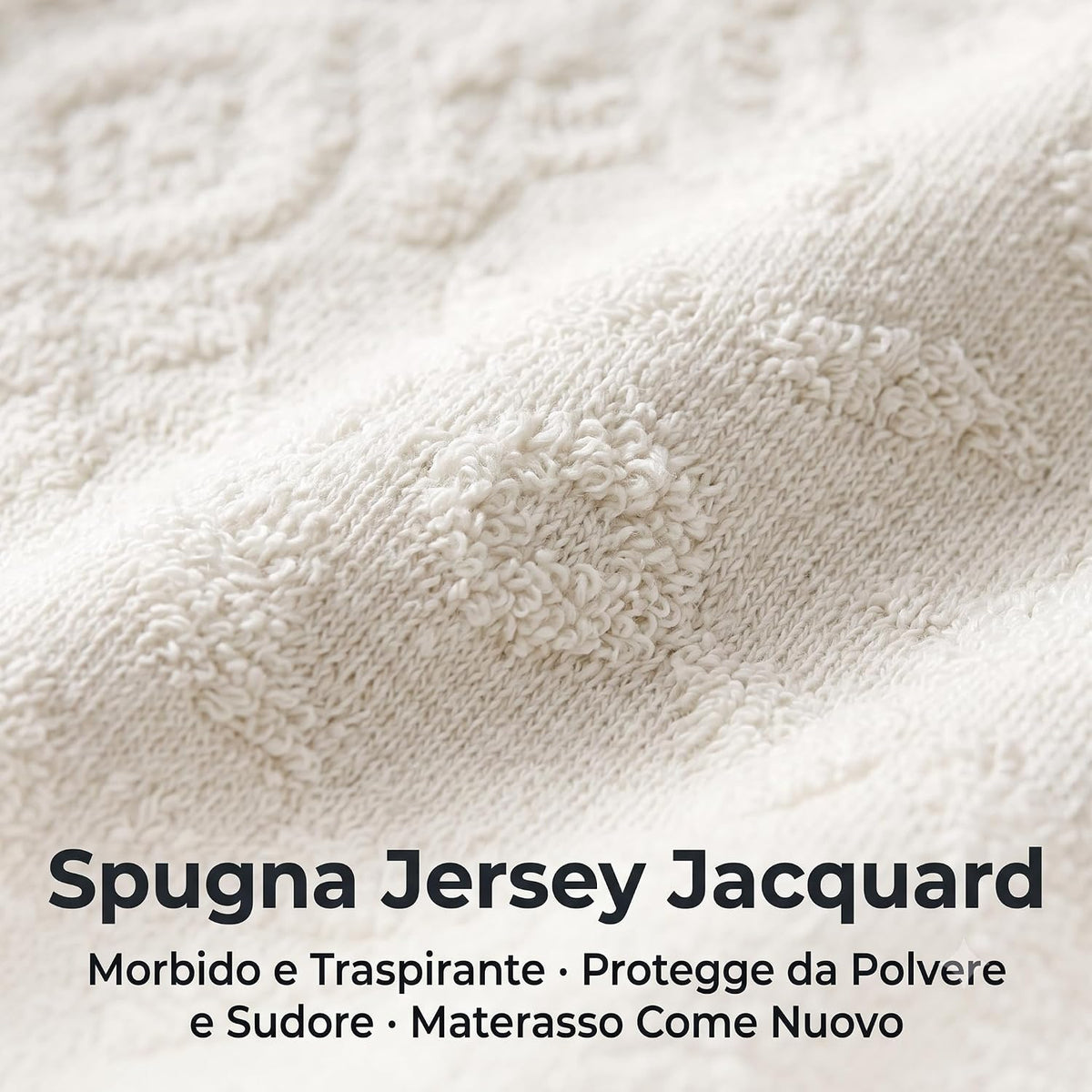 Dettaglio del tessuto in spugna jersey jacquard del coprimaterasso matrimoniale 180x200 morbido e traspirante.