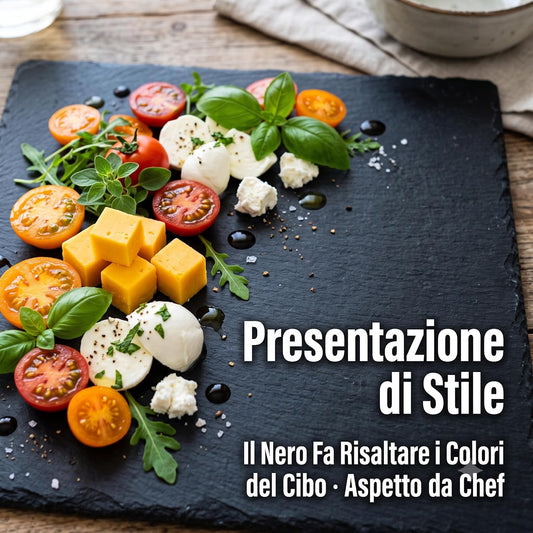 Presentazione di stile con i vassoi effetto lavagna per aperitivo decorati con formaggi, pomodorini e basilico.